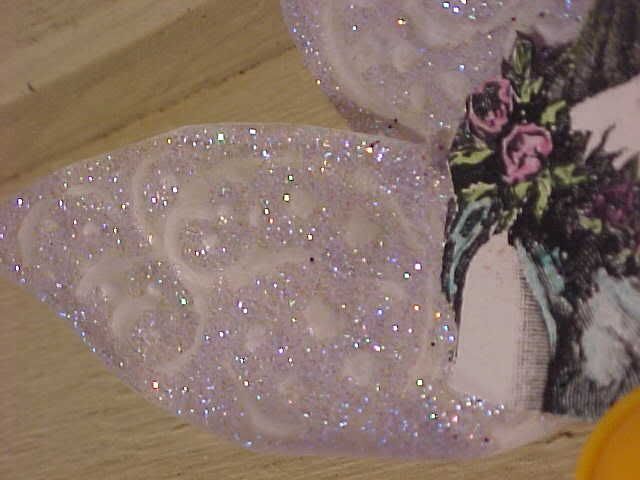 embossed wings of button fairy 2009